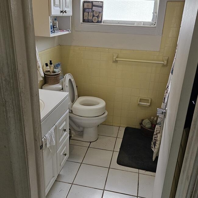 7202 Northwest 73rd Street Tamarac, FL 33321 - Photo 4 of 11 a bathroom with a toilet and a sink