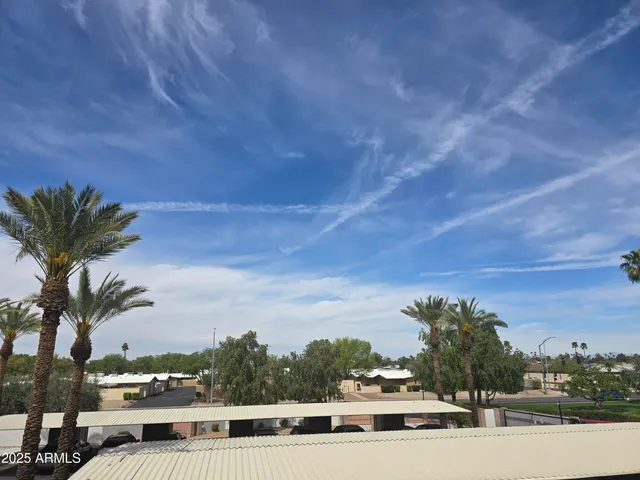an aerial view of a house with swimming pool