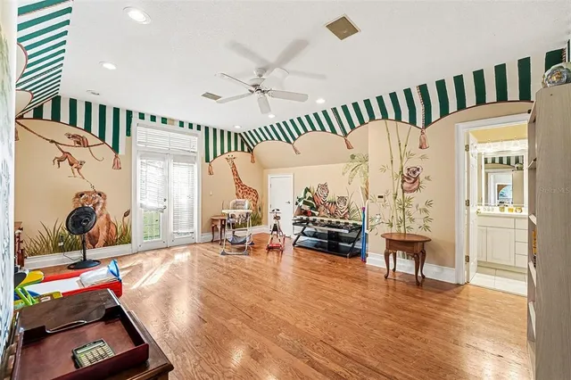 a view of a backyard with sitting area