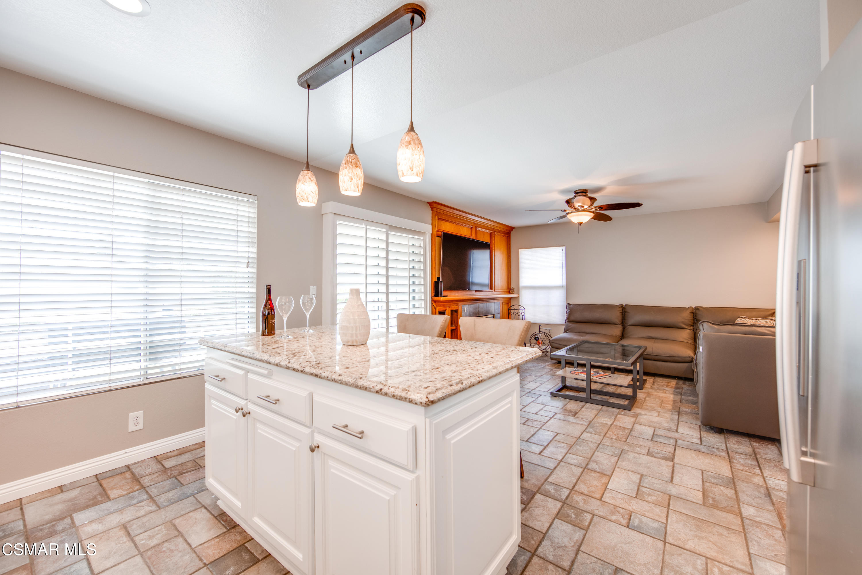 1763 Empty Saddle Road Simi Valley, CA 93063 - Photo 14 of 36 a kitchen with a sink a counter top space and appliances