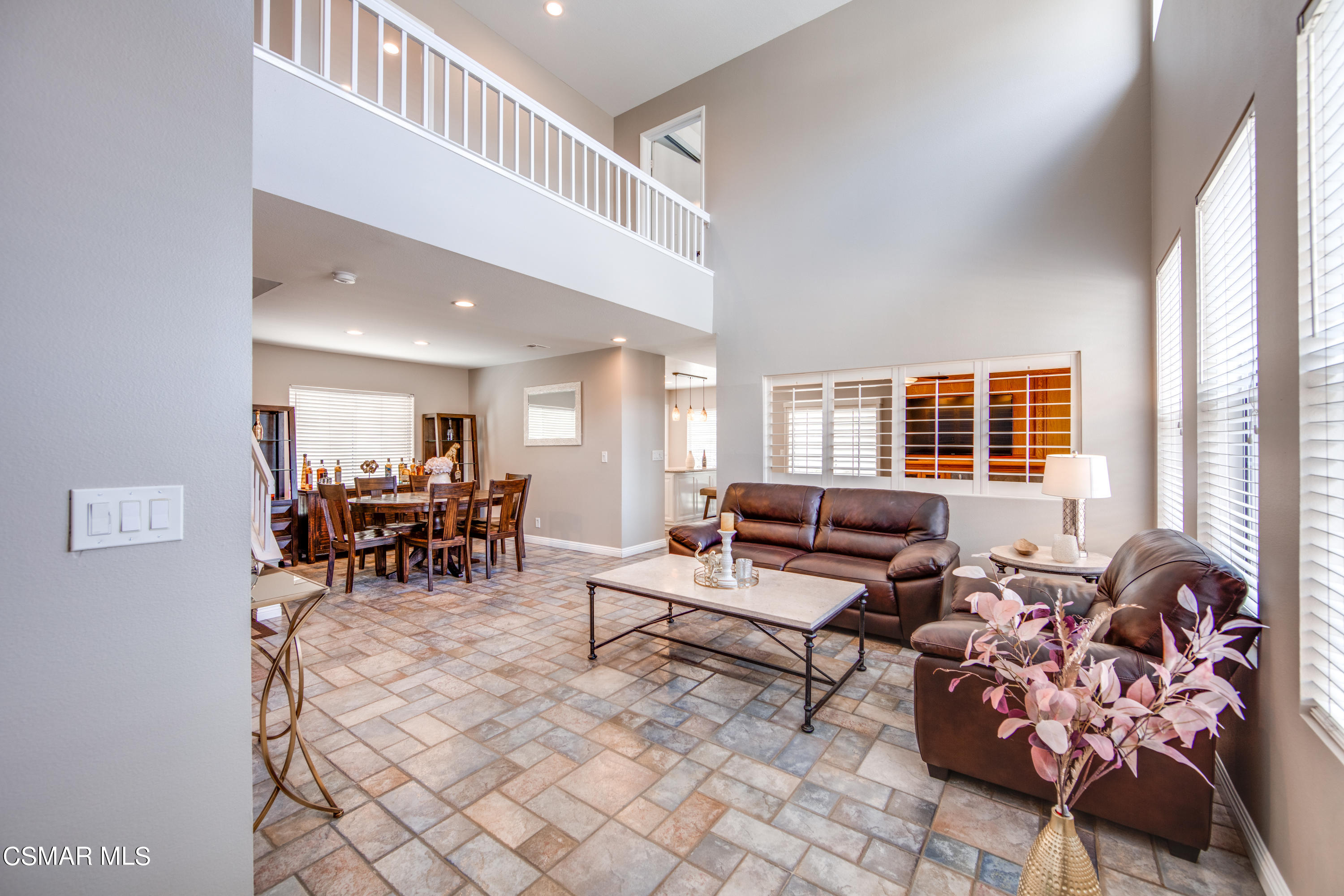 1763 Empty Saddle Road Simi Valley, CA 93063 - Photo 3 of 36 a living room with furniture and a large window