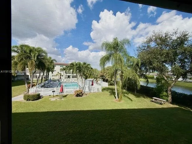 a view of a park with swings