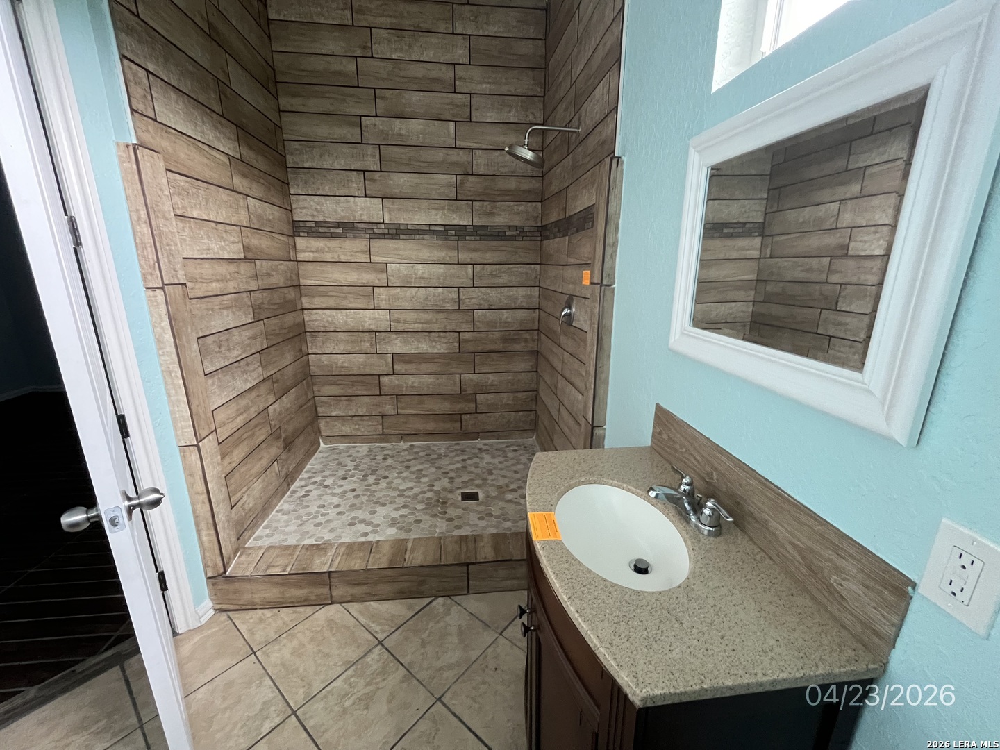 2250 Golf Drive Spring Branch, TX 78070 - Photo 8 of 20 a bathroom with a sink a toilet and shower