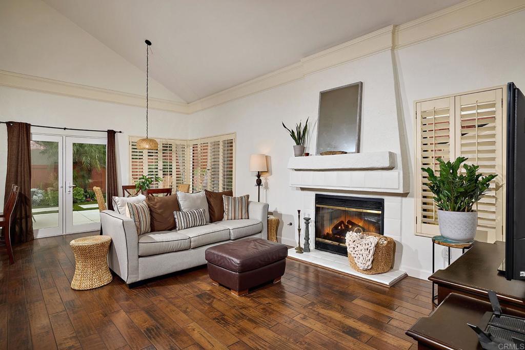 1134 Calle Christopher Encinitas, CA 92024 - Photo 13 of 37 a living room with furniture and a fireplace