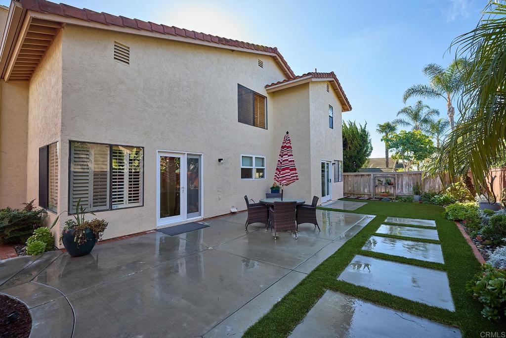 1134 Calle Christopher Encinitas, CA 92024 - Photo 20 of 37 a backyard of a house with outdoor seating