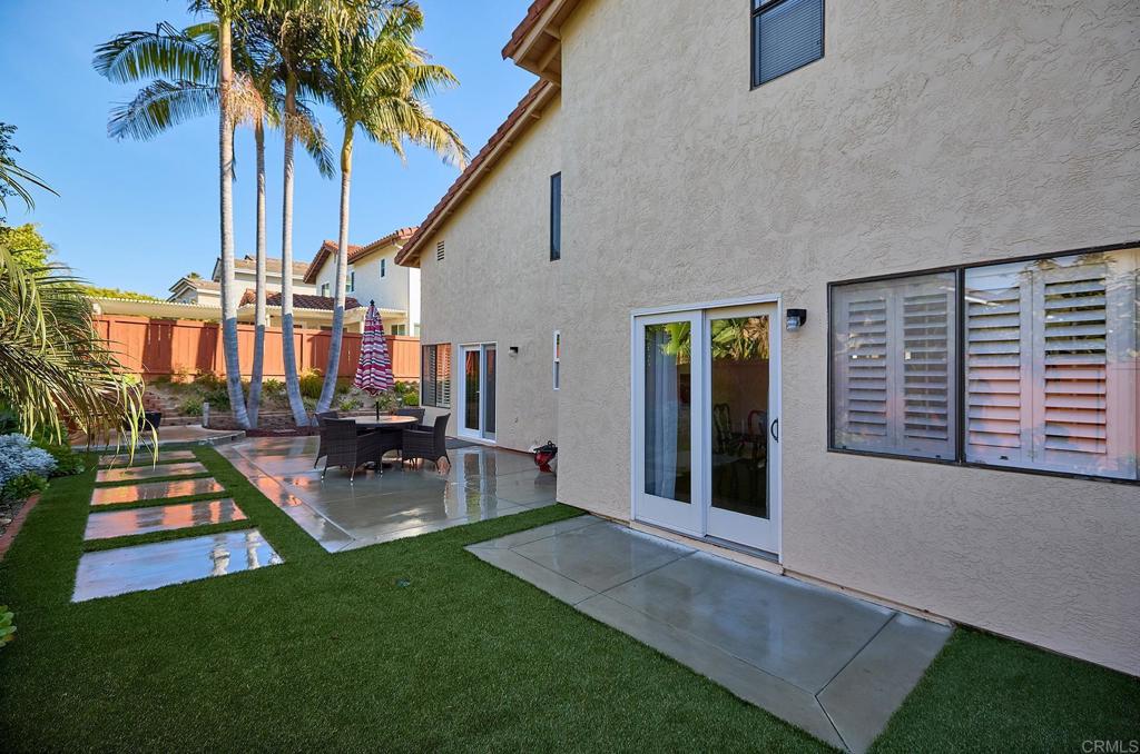 1134 Calle Christopher Encinitas, CA 92024 - Photo 21 of 37 a view of a house with backyard porch and sitting area