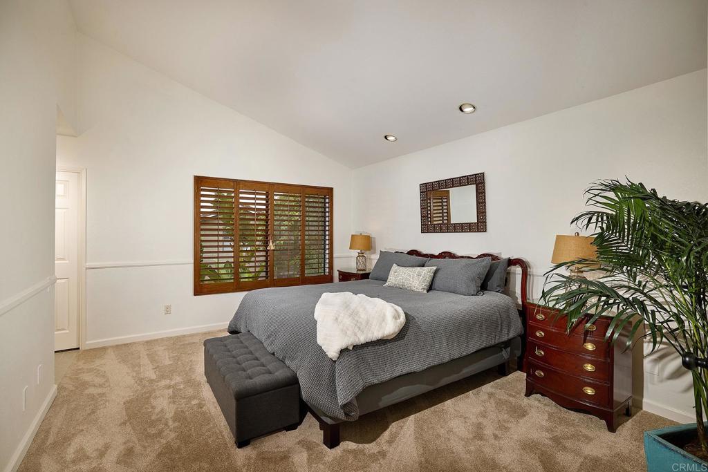 1134 Calle Christopher Encinitas, CA 92024 - Photo 23 of 37 a living room with furniture and a large window