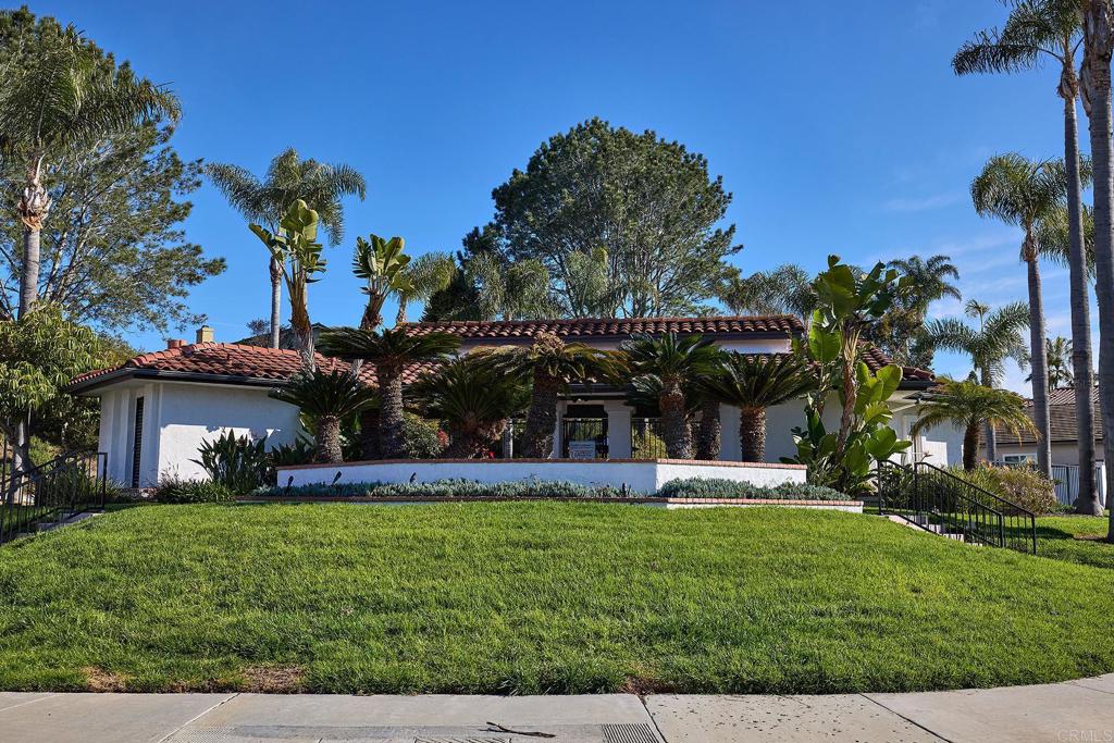 1134 Calle Christopher Encinitas, CA 92024 - Photo 31 of 37 a view of a house with a yard