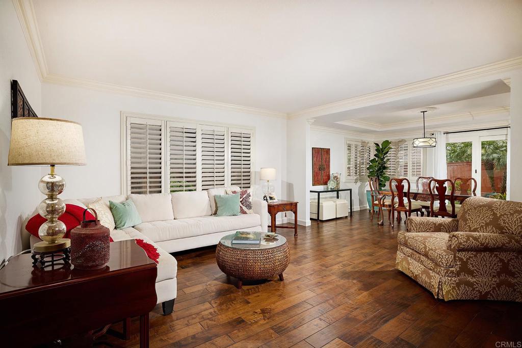 1134 Calle Christopher Encinitas, CA 92024 - Photo 4 of 37 a living room with furniture and a large window