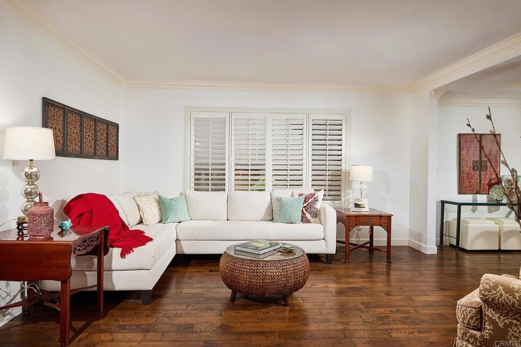 1134 Calle Christopher Encinitas, CA 92024 - Photo 5 of 37 a living room with furniture and a large window