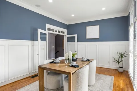 a kitchen with a sink and a refrigerator