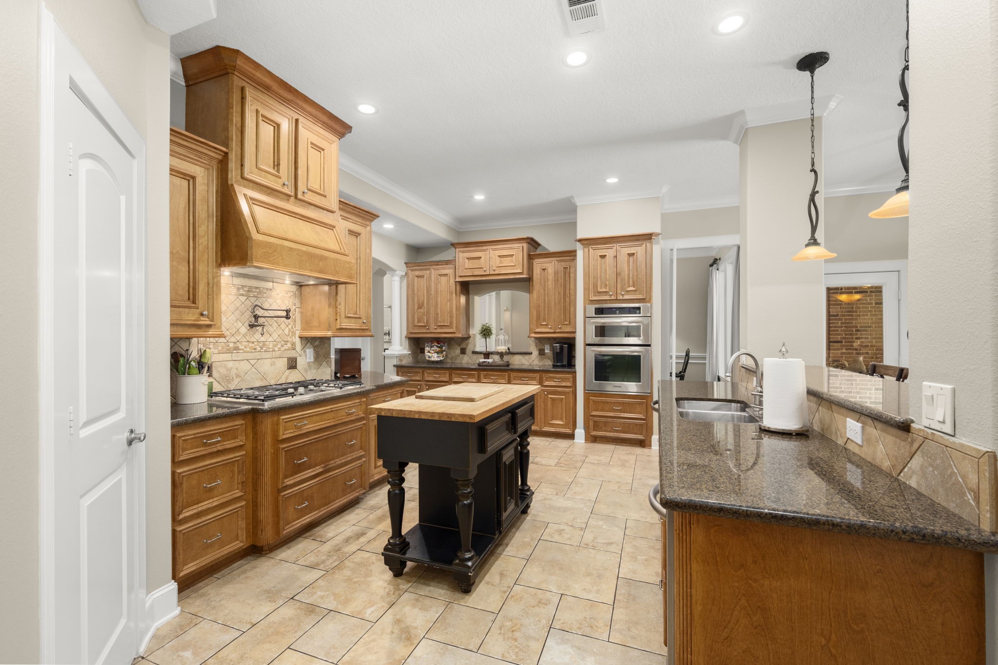 4106 Angling Lane Spring, TX 77386 - Photo 20 of 50 Elegant pass thru countertop to the dining area