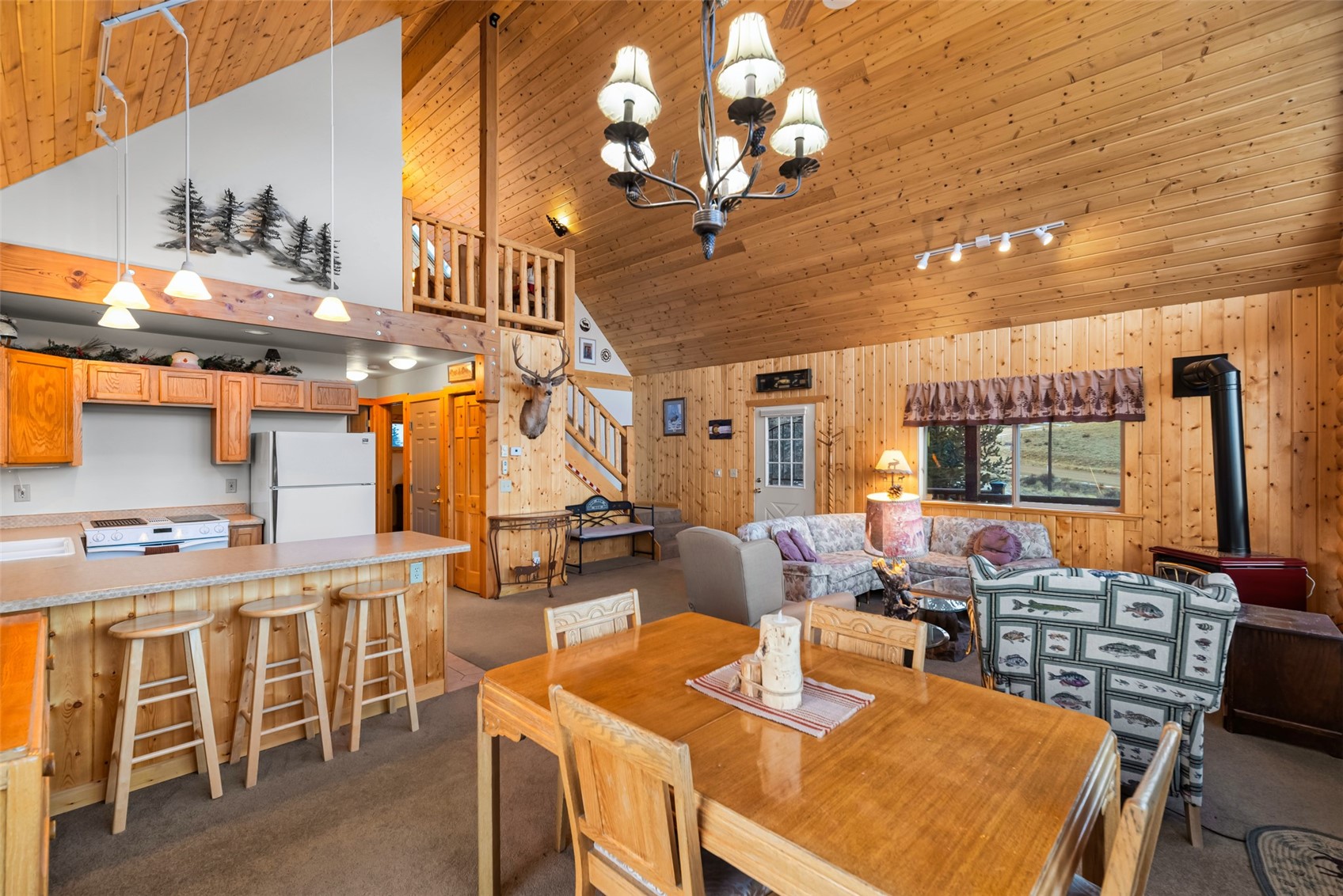 1081 Travois Road Como, CO 80456 - Photo 11 of 44 a view of a dining room with furniture window and outside view