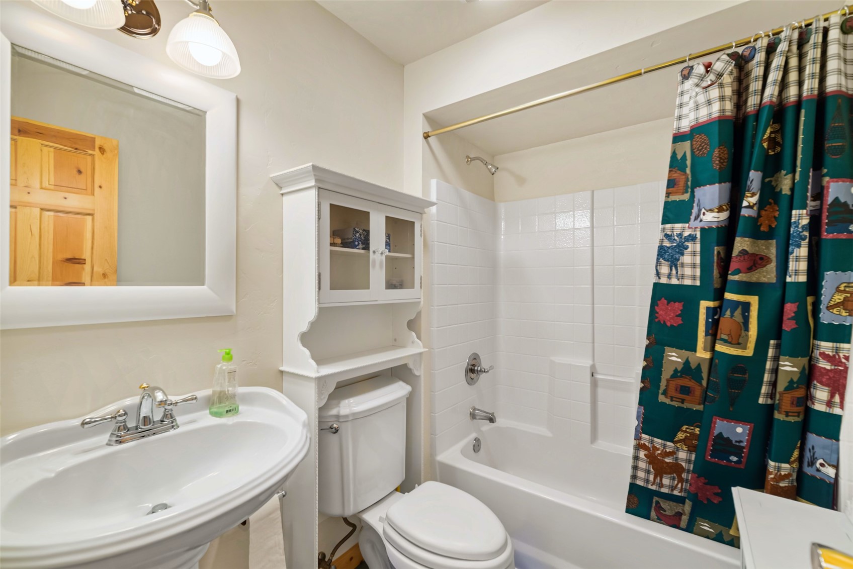 1081 Travois Road Como, CO 80456 - Photo 15 of 44 a bathroom with a sink toilet and shower