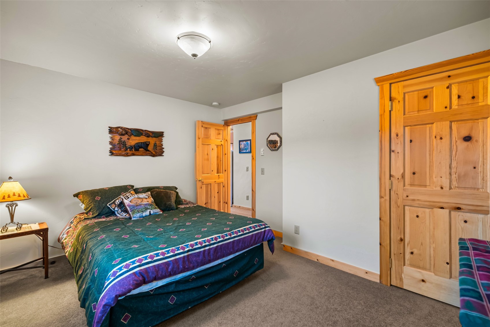 1081 Travois Road Como, CO 80456 - Photo 18 of 44 a bedroom with a bed and a window