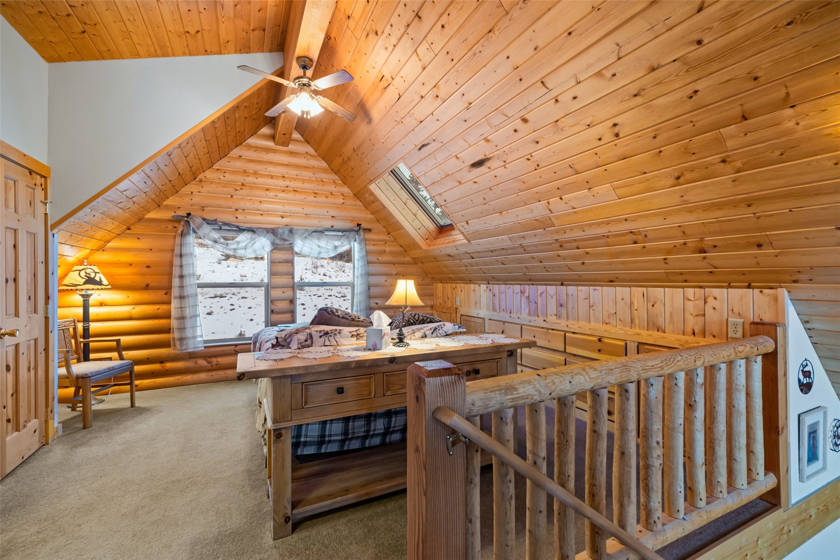 1081 Travois Road Como, CO 80456 - Photo 24 of 44 a view of a kitchen with stainless steel appliances wooden floor and furniture