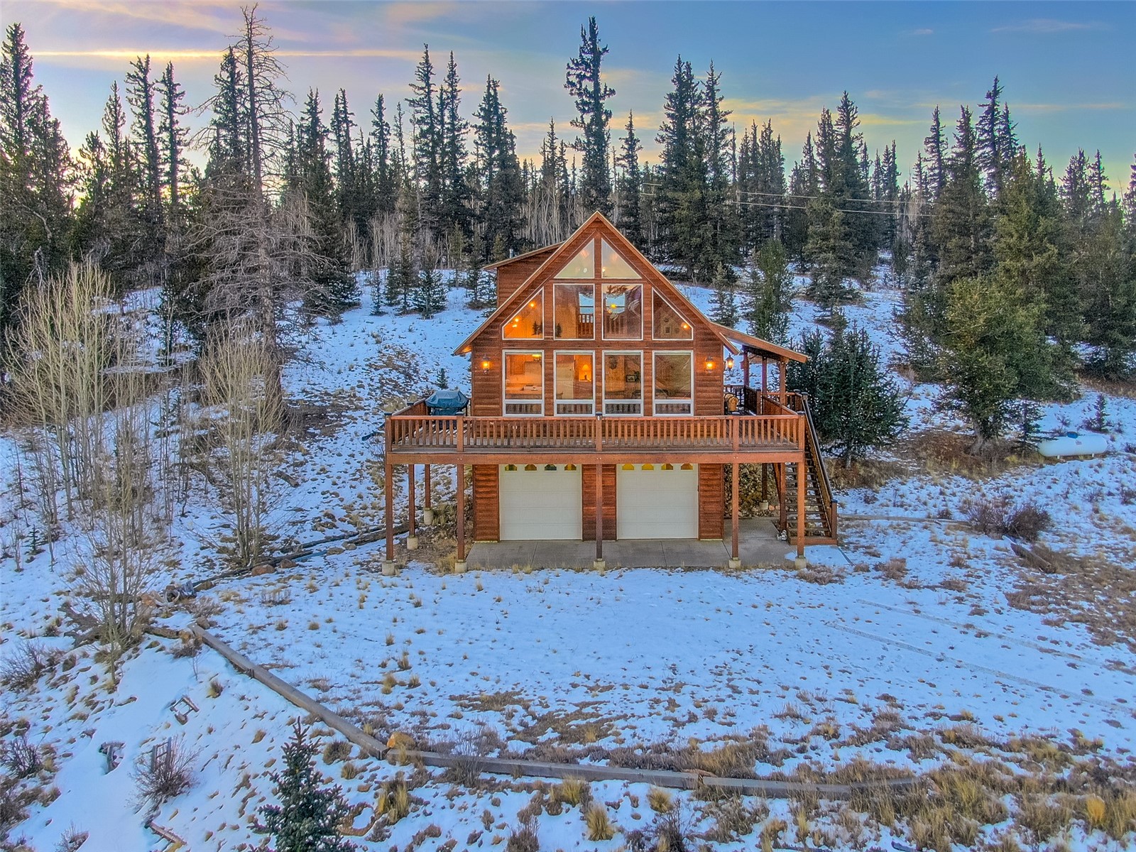 1081 Travois Road Como, CO 80456 - Photo 31 of 44 a view of a house with a yard