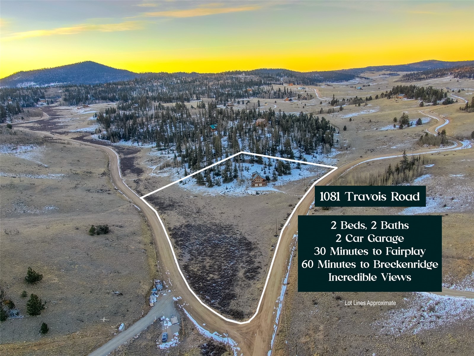 1081 Travois Road Como, CO 80456 - Photo 33 of 44 a view of a swimming pool with a table and chairs