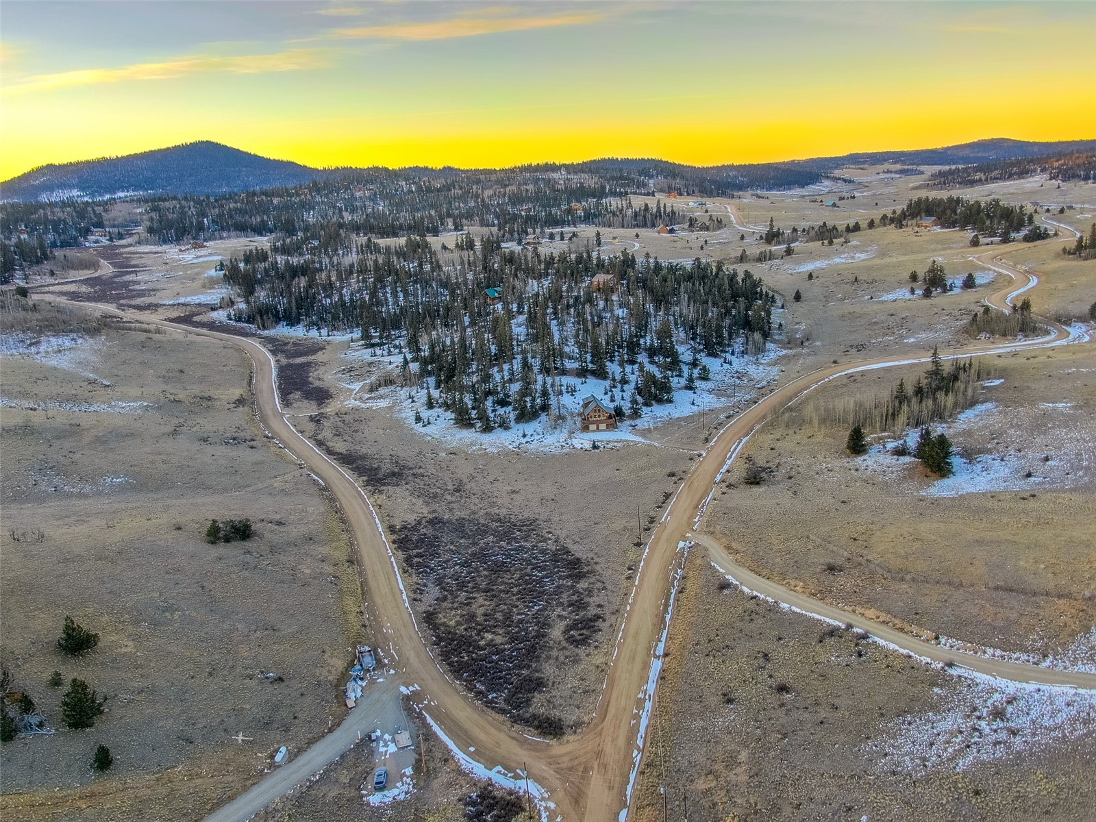 1081 Travois Road Como, CO 80456 - Photo 34 of 44 a view of a swimming pool with mountains in the background