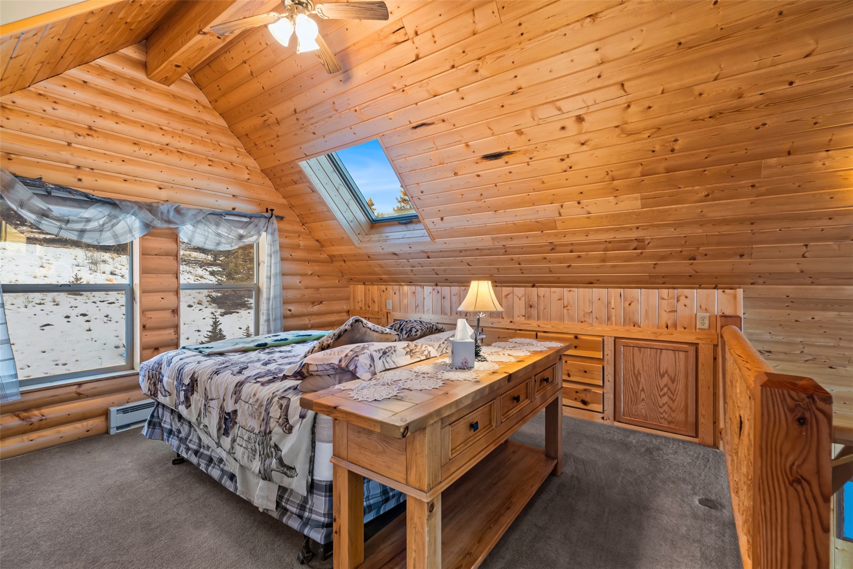 1081 Travois Road Como, CO 80456 - Photo 40 of 44 a bed room with a bed and window