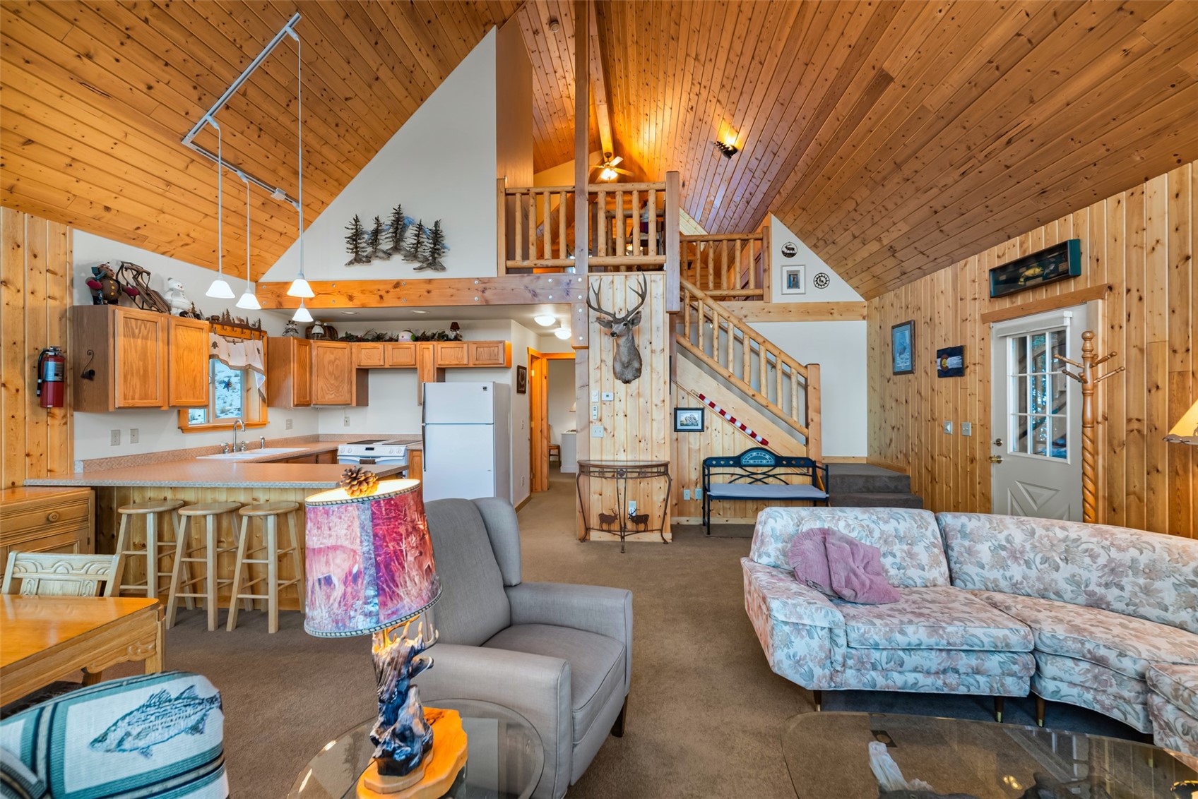 1081 Travois Road Como, CO 80456 - Photo 4 of 44 a living room with furniture and a ceiling fan