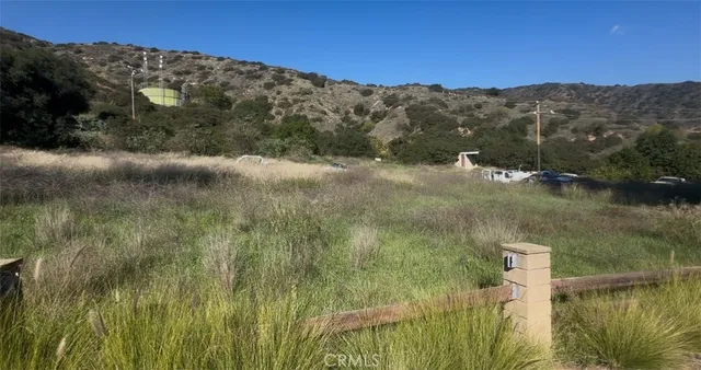 a view of a lake with a mountain in the background