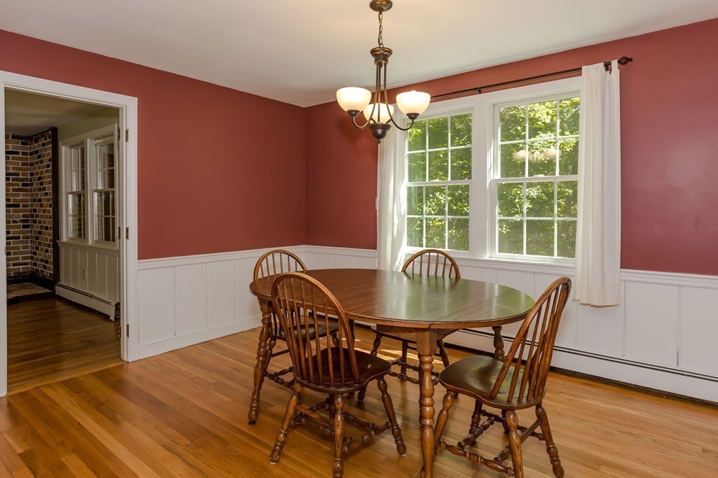 192 Newbridge Road Sudbury, MA 01776 - Photo 8 of 20 a view of a dining room with furniture window and wooden floor