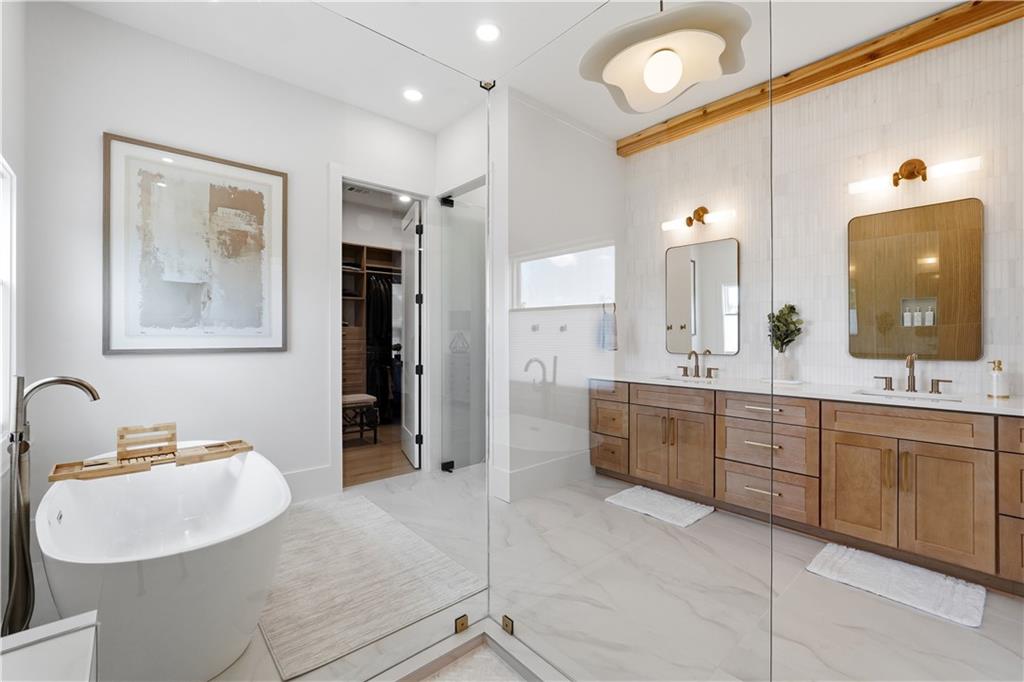 237 Lask Lane Milton, GA 30004 - Photo 42 of 63 a bathroom with a sink and a mirror