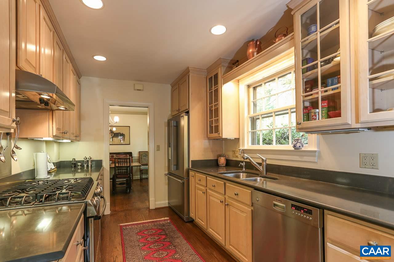 1855 Westview Road Charlottesville, VA 22903 - Photo 7 of 25 a kitchen with stainless steel appliances a sink stove and cabinets