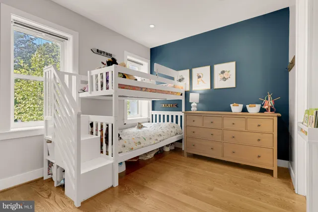 a room with furniture and white walls