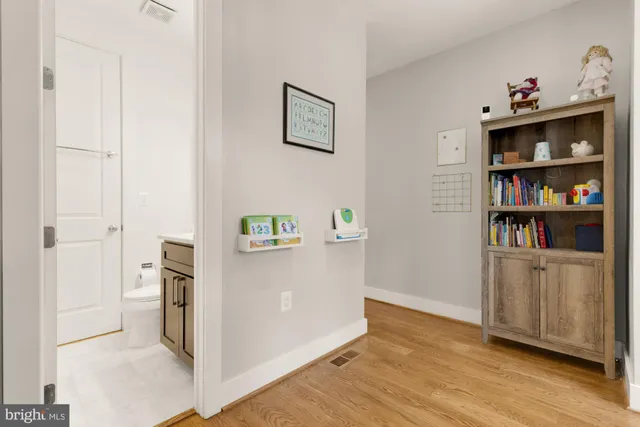 a view of kitchen and wooden floor