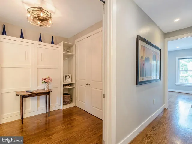 a view of a hallway with workspace