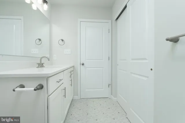 a view of a room with racks on the wall