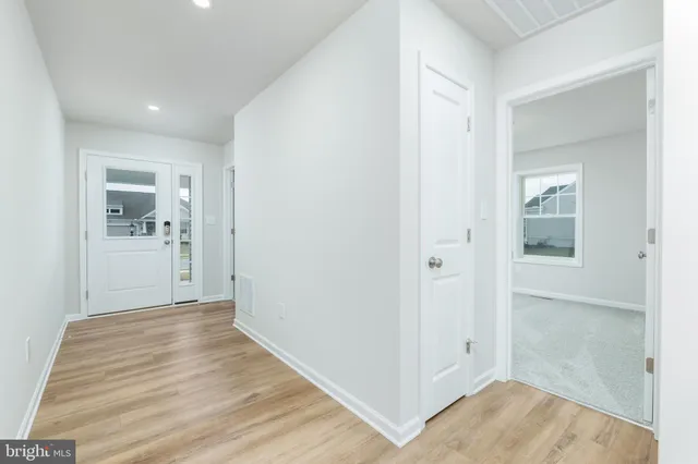 a view of a bathroom with a shower and a sink