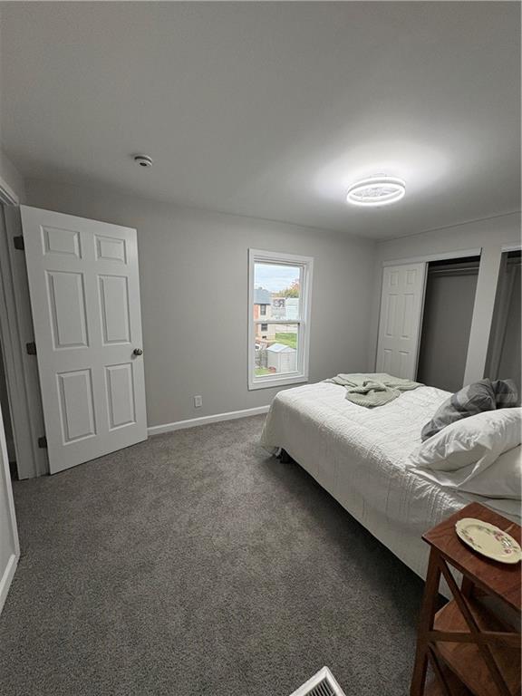 1106 Wade Street Aliquippa, PA 15001 - Photo 15 of 32 a spacious bedroom with a bed and a window