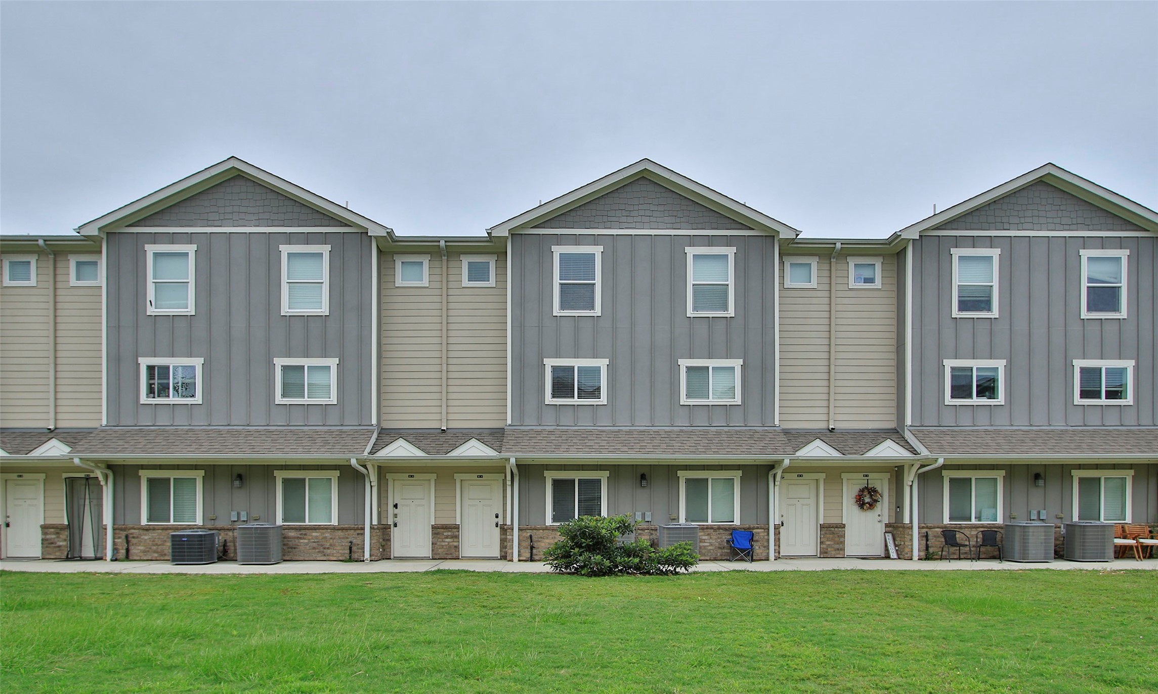 21155 Gosling Road, Unit 22A Spring, TX 77388 - Photo 1 of 28 a front view of a house with a yard
