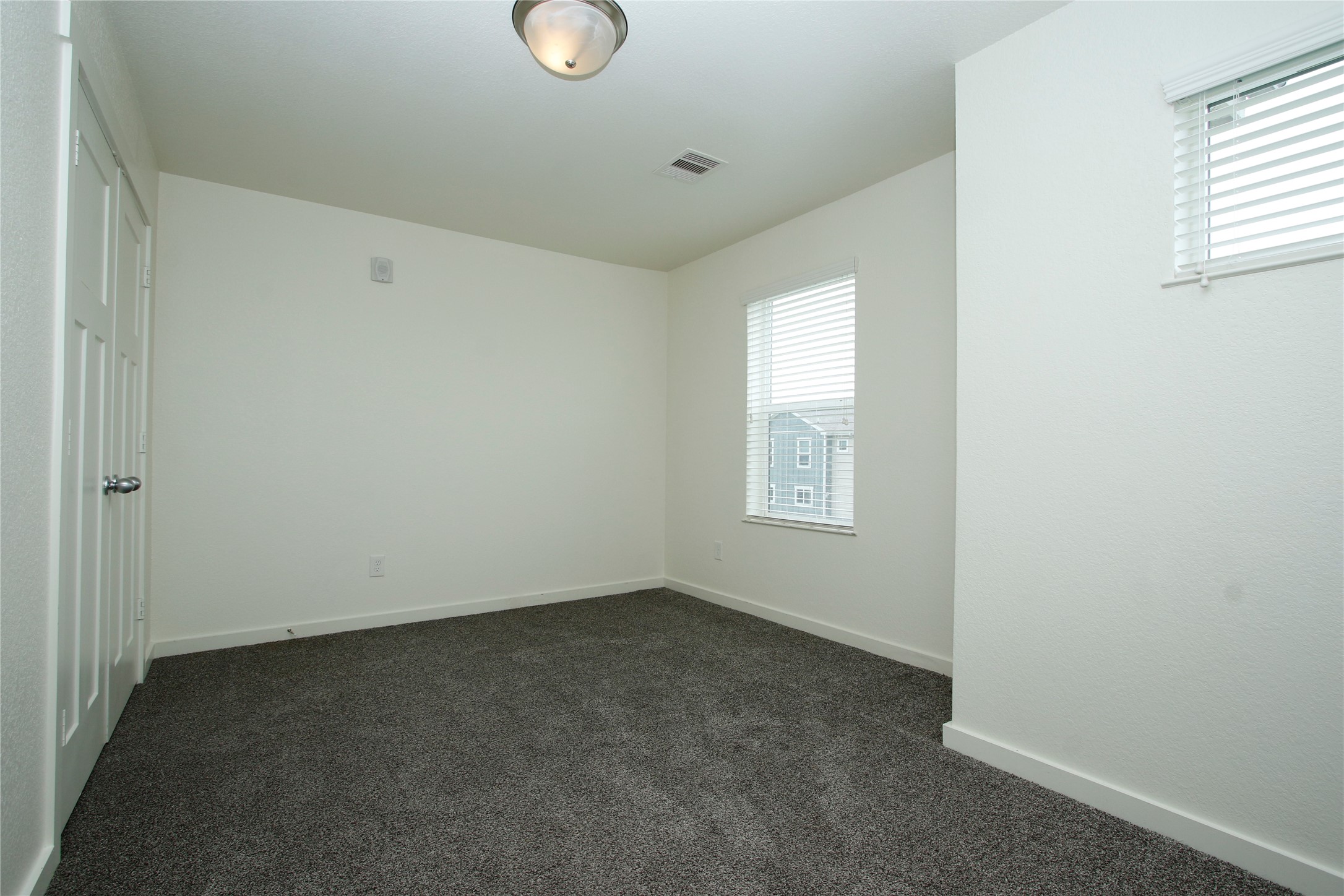 21155 Gosling Road, Unit 22A Spring, TX 77388 - Photo 22 of 28 an empty room with windows