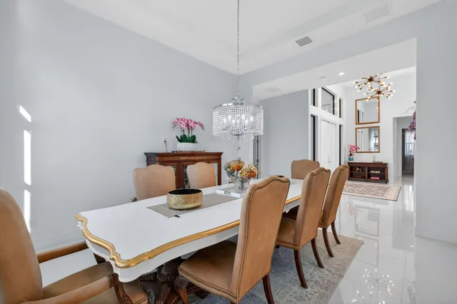a bathroom with a granite countertop sink toilet a mirror a vanity and shower