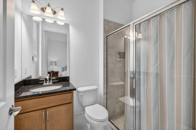 an aerial view of residential house with outdoor space and swimming pool