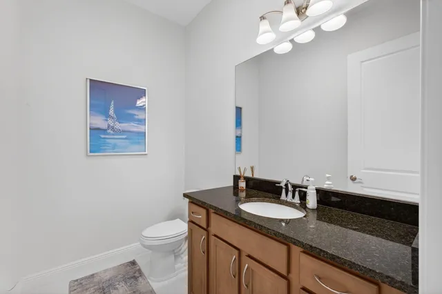 a view of swimming pool with a garden and seating area