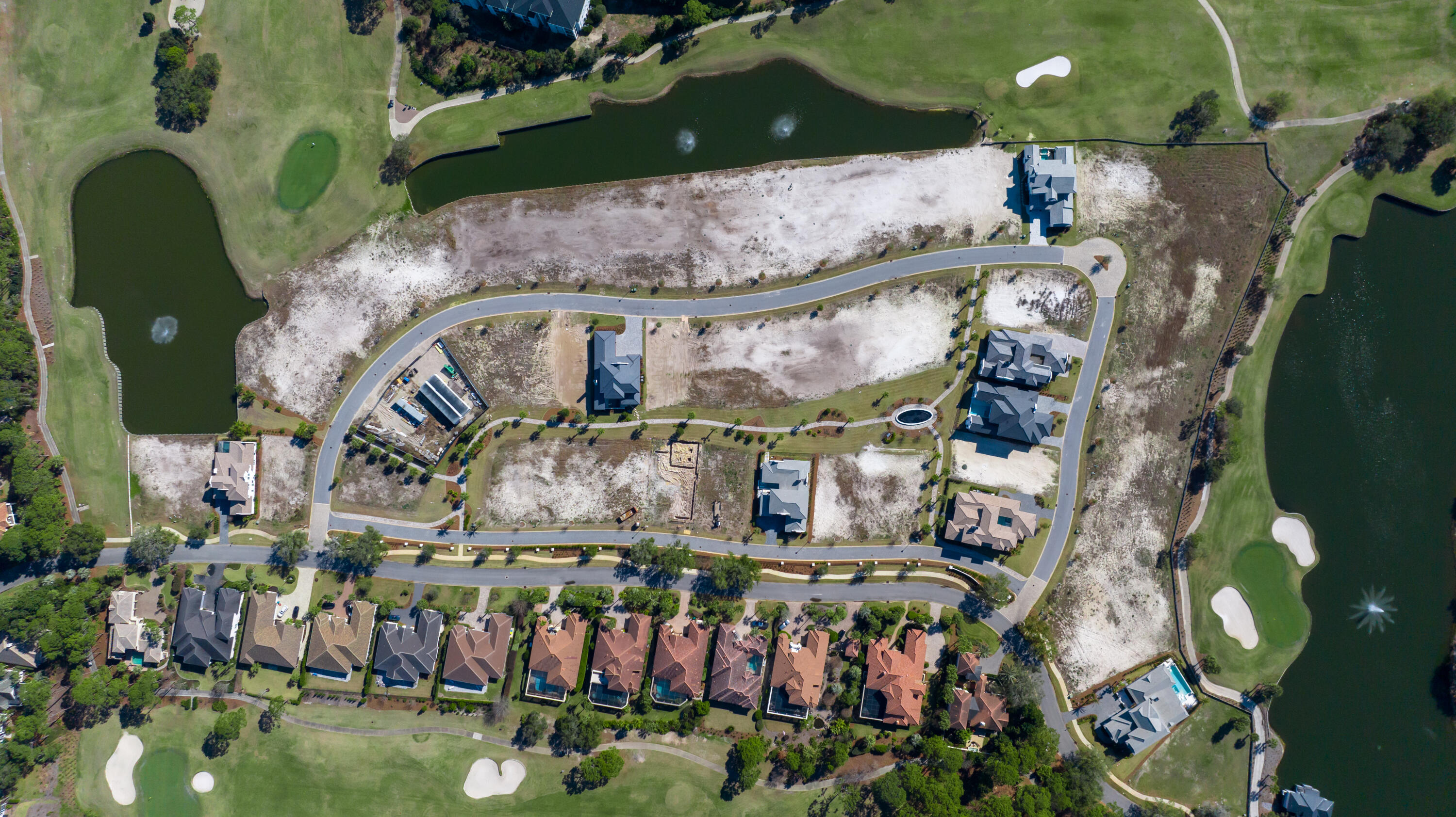 4683 Westwinds Way Destin, FL 32541 - Photo 4 of 6 an aerial view of a house with a yard and large trees