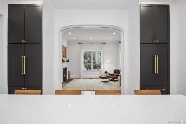 a view of a living room and bathroom