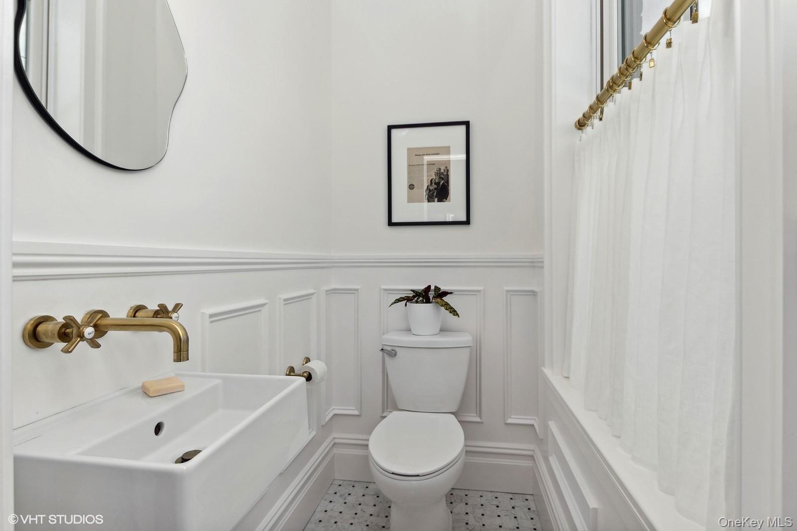 33 Davis Street Beacon, NY 12508 - Photo 25 of 46 a bathroom with a sink a toilet and a bathtub