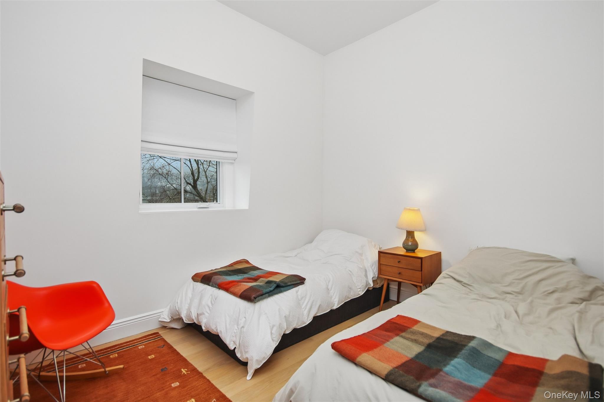 33 Davis Street Beacon, NY 12508 - Photo 33 of 46 a bedroom with two beds and a chair