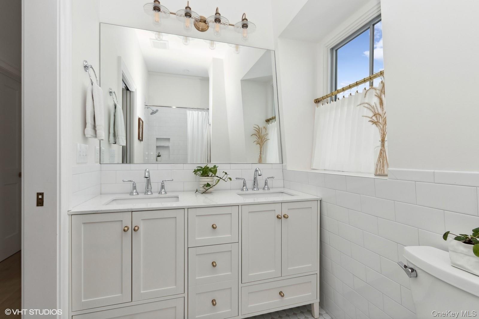 33 Davis Street Beacon, NY 12508 - Photo 34 of 46 a bathroom with a sink vanity granite and a mirror
