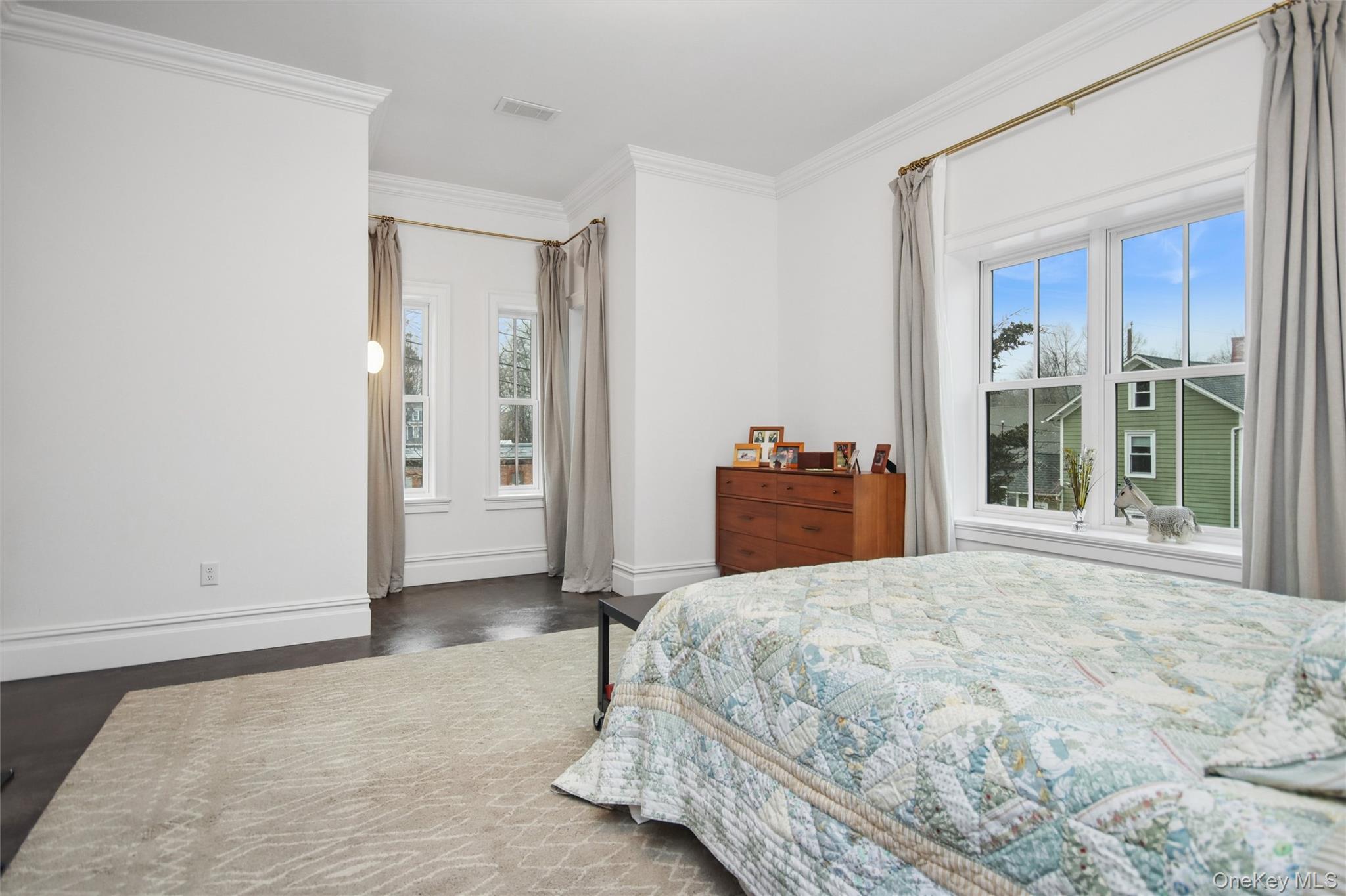 33 Davis Street Beacon, NY 12508 - Photo 37 of 46 a large bedroom with a bed and a window