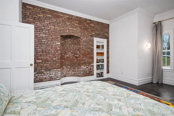 a view of a door with wooden floor and a door