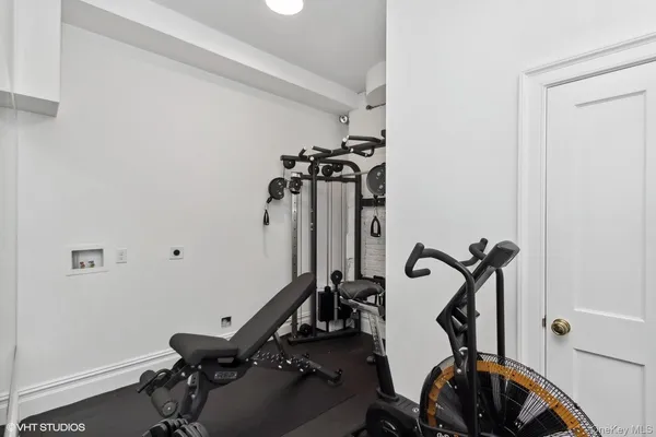 a view of a room with gym equipment