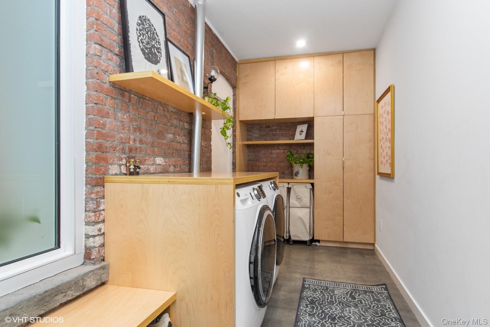 33 Davis Street Beacon, NY 12508 - Photo 43 of 46 a view of a storage & utility room with a washer dryer