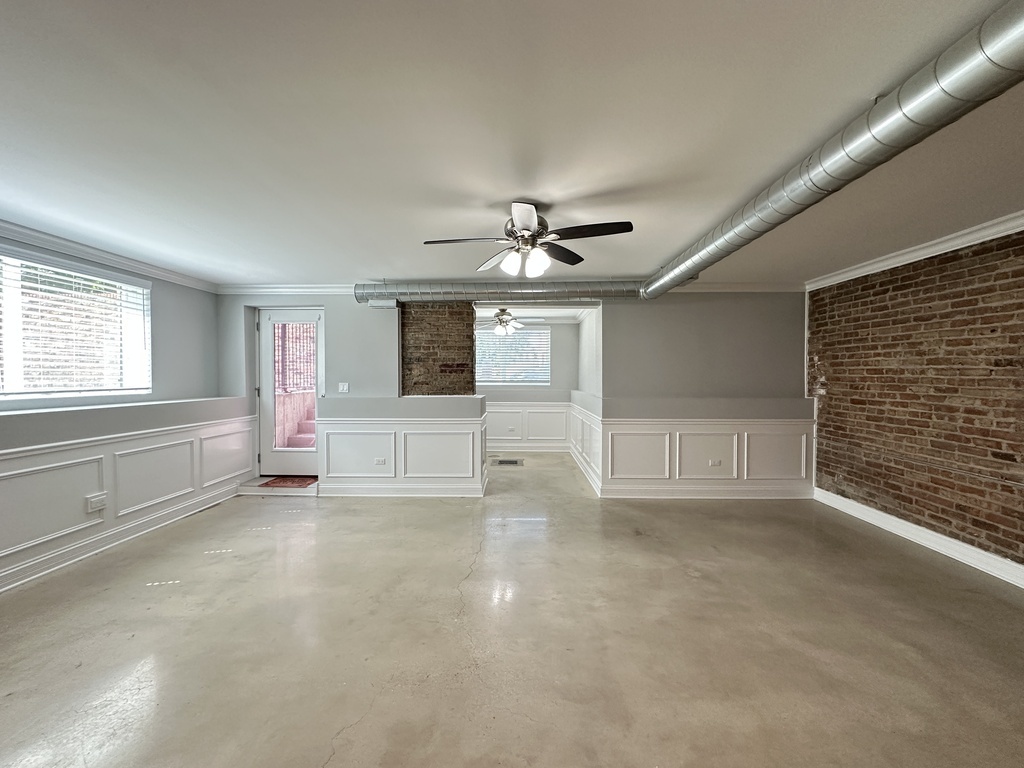 4117 South Michigan Avenue, Unit GS Chicago, IL 60653 - Photo 10 of 20 a view of an empty room with a window